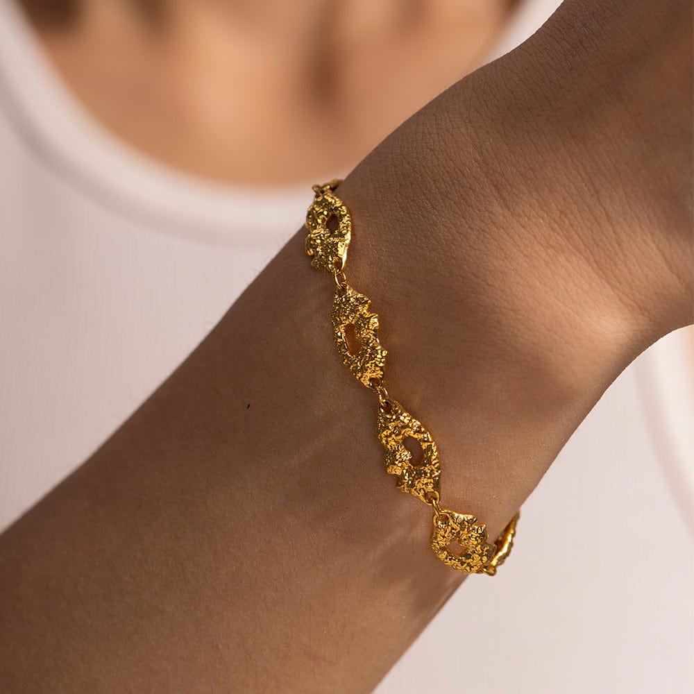 MILA- TEXTURED BRACELET- GOLD. Luxurious Mi Amore gold jewelry, a timeless addition to your collection. Find the finest gold jewelry in Trinidad and Tobago.